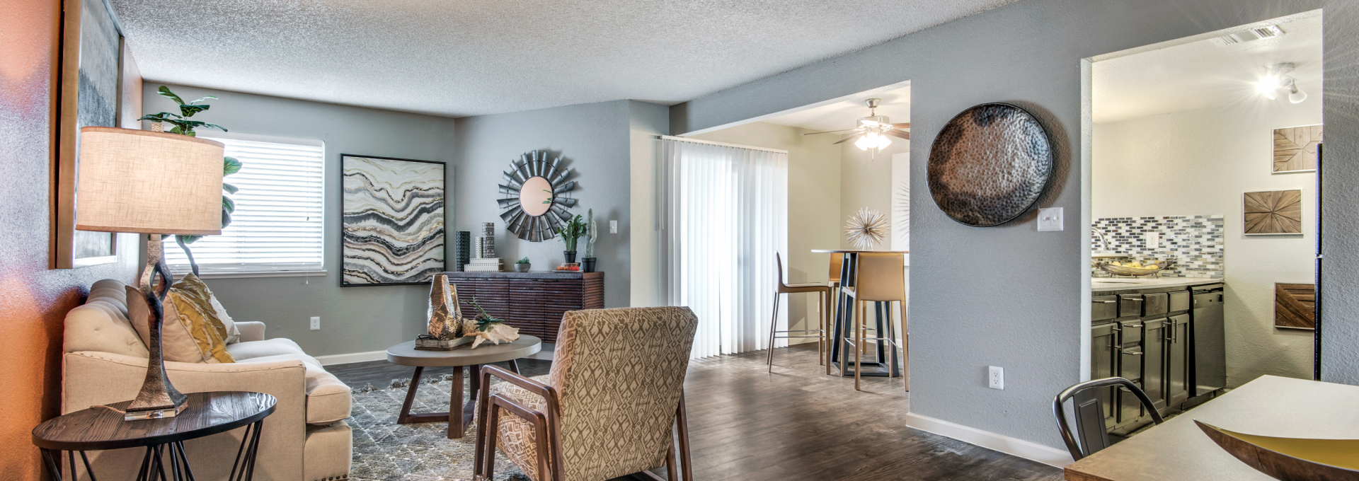 the living room and kitchen area of a home at The  Mark at 2600