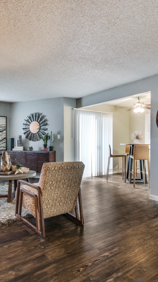 the living room and kitchen area of a home at The  Mark at 2600