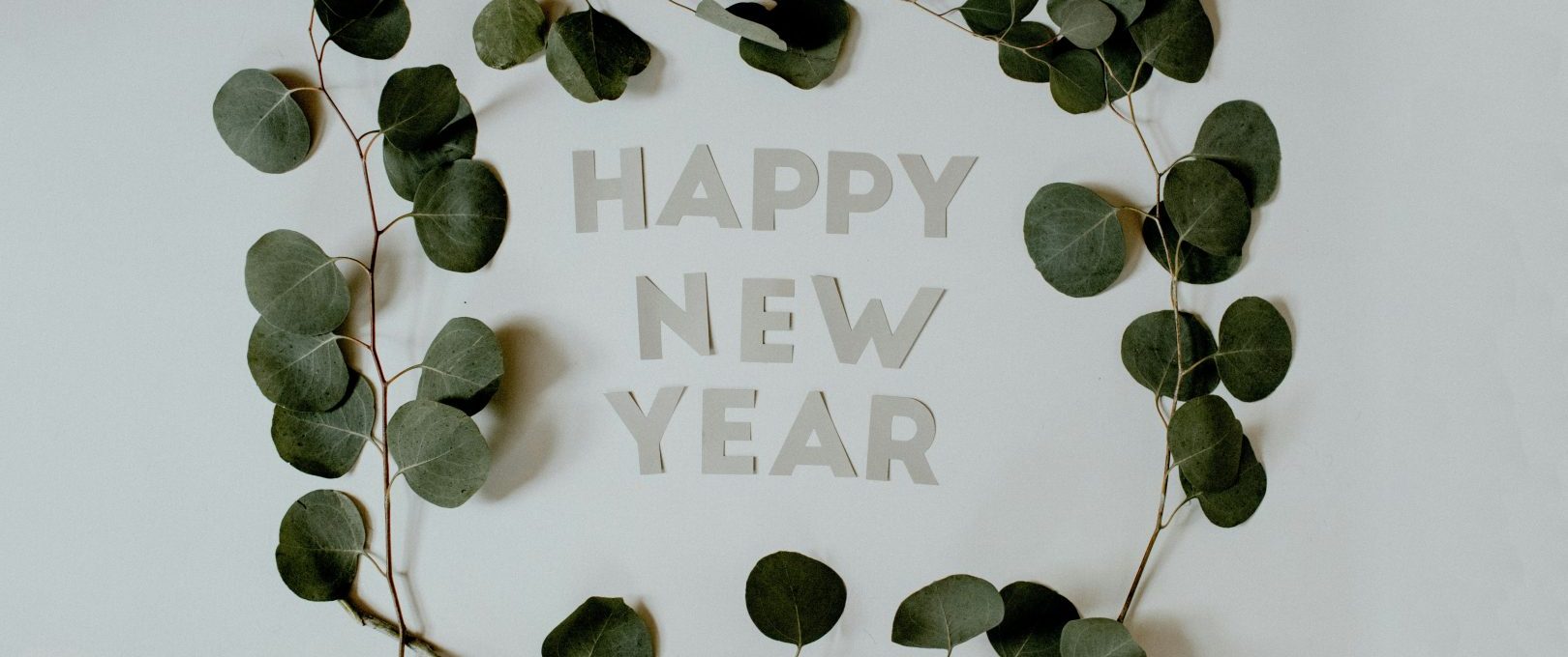 happy new year greeting card with eucalyptus leaves at The  Mark at 2600